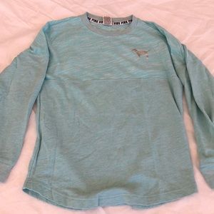 Pink long sleeve crew neck.